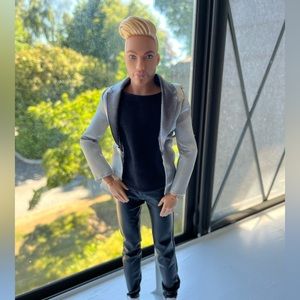 Handsome Ken Doll, includes a plastic black based stand.